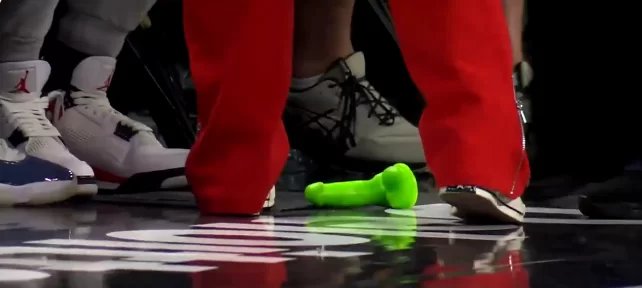 Fan arrested for throwing green dildo on WNBA court Fan arrested for throwing green dildo on WNBA court