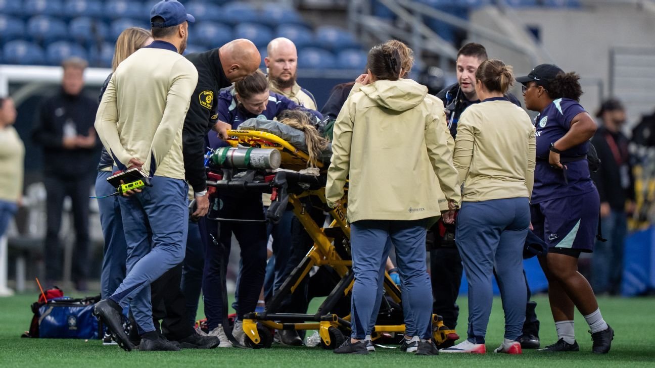 Reign vs. Racing NWSL match abandoned after DeMelo collapses Reign vs. Racing NWSL match abandoned after DeMelo collapses