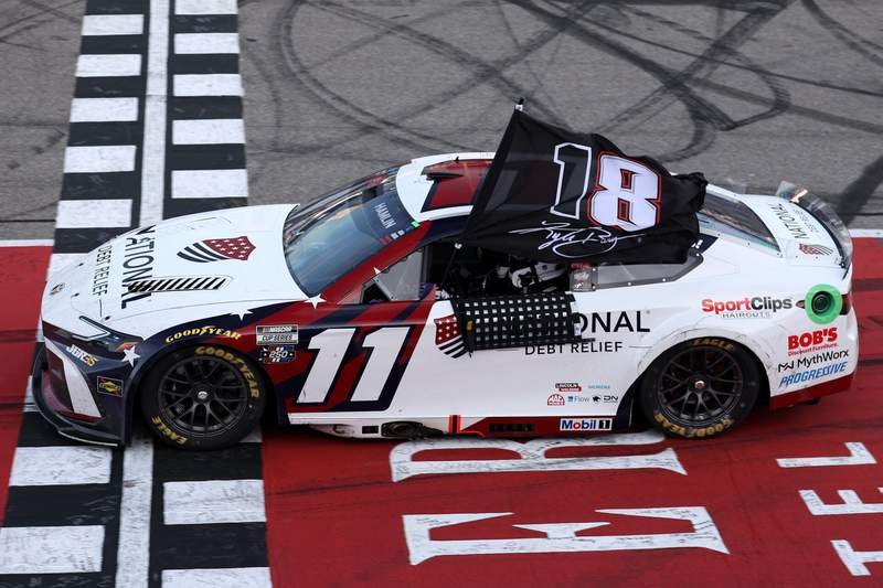 Denny Hamlin used unique flag to pay tribute to Kyle Busch after FireKeepers Casino 400 Denny Hamlin used unique flag to pay tribute to Kyle Busch after FireKeepers Casino 400